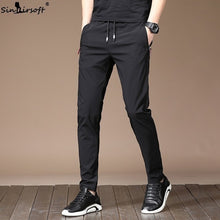Load image into Gallery viewer, Men's Summer Casual Sport Pants Men Elastic Nine Pants Small Feet Joggers Pants Drawstring Beam Pants Versatile Trousers Homme